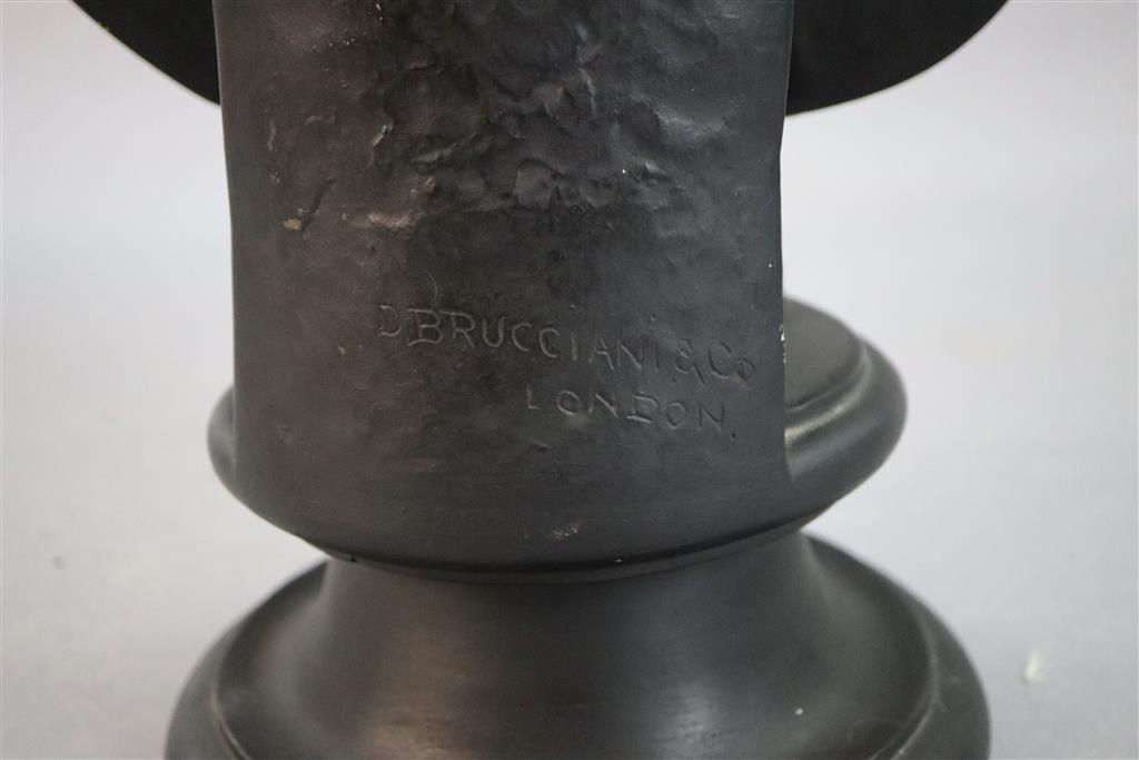 D. Brucciani & Co of London. An ebonised plaster bust of Augustus, height 27in.